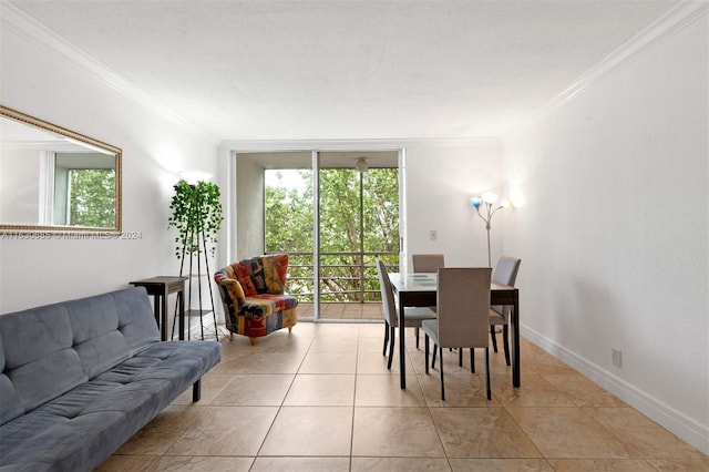 dining area featuring ornamental molding and light tile patterned flooring