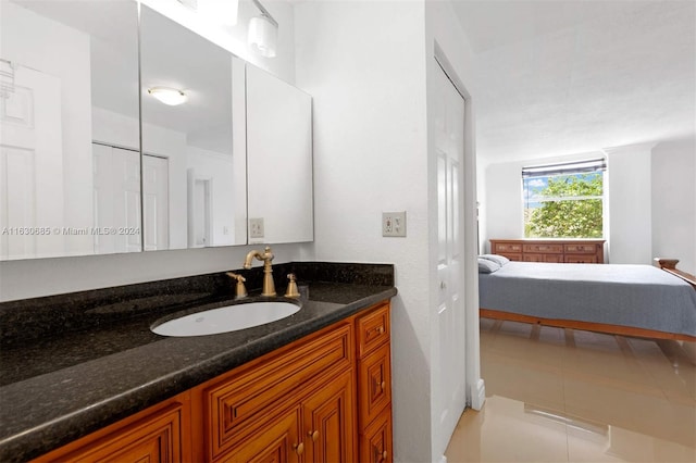 bathroom featuring vanity and tile patterned floors