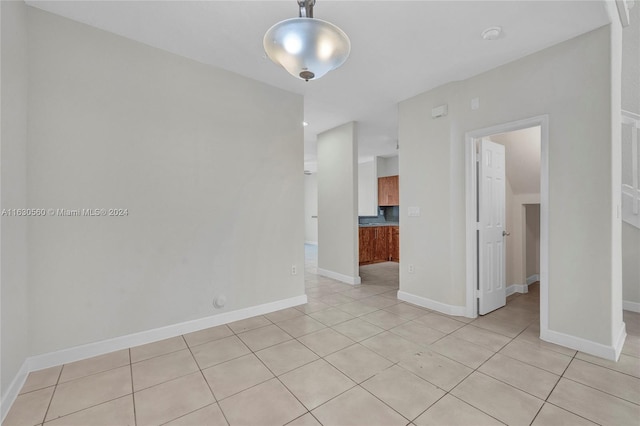 view of tiled spare room