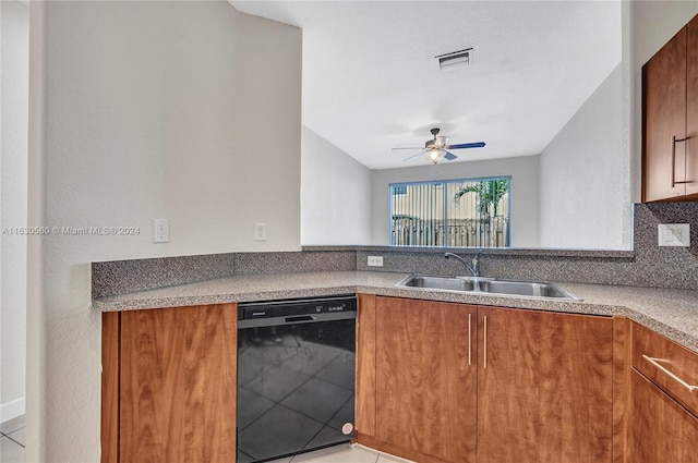 kitchen featuring black dishwasher, tasteful backsplash, sink, light tile patterned flooring, and ceiling fan