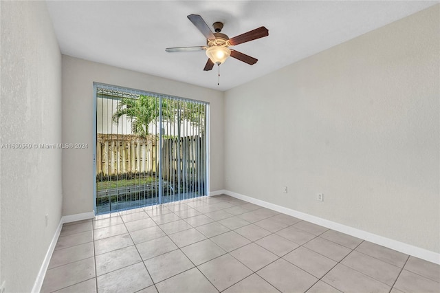 unfurnished room featuring light tile patterned flooring and ceiling fan