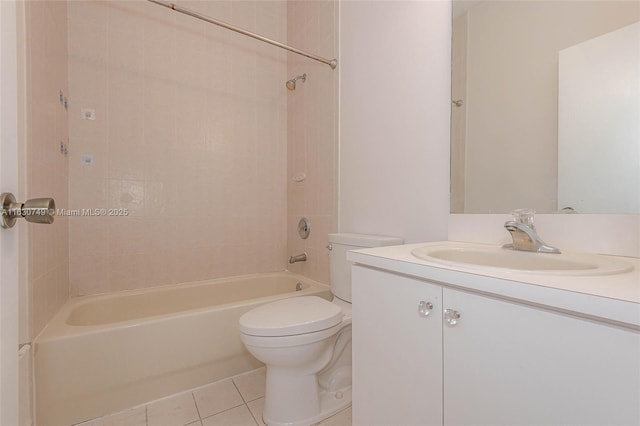 full bath featuring toilet, vanity, bathtub / shower combination, and tile patterned floors