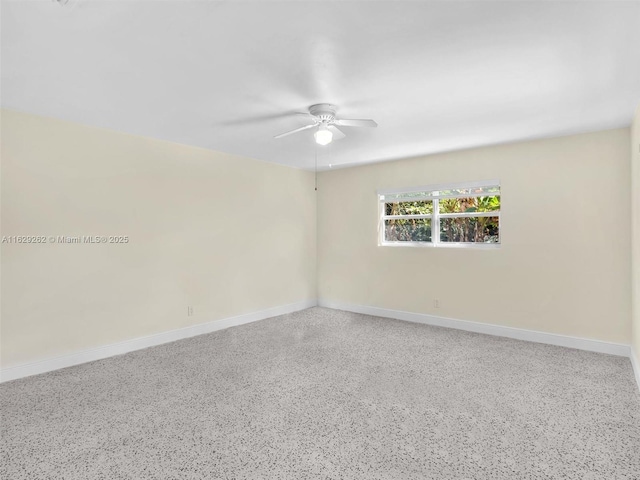 unfurnished room with ceiling fan