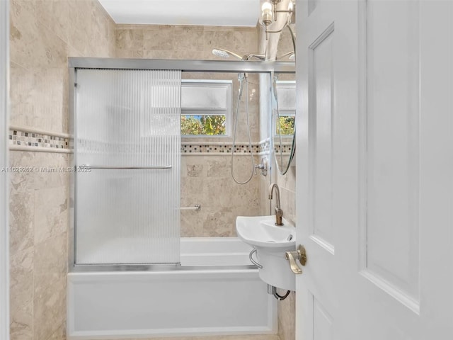 bathroom featuring enclosed tub / shower combo