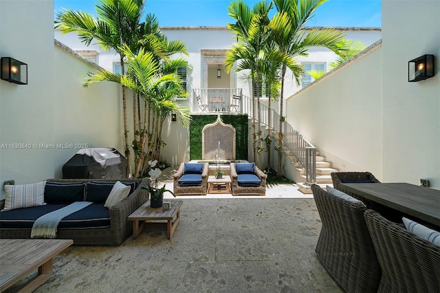 view of patio / terrace featuring a grill and an outdoor hangout area