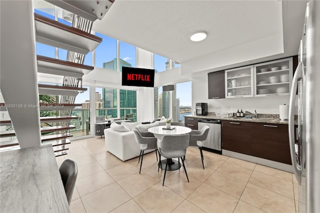 dining room featuring light tile patterned flooring