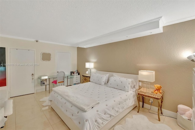 bedroom featuring light tile patterned flooring, a textured ceiling, and ornamental molding