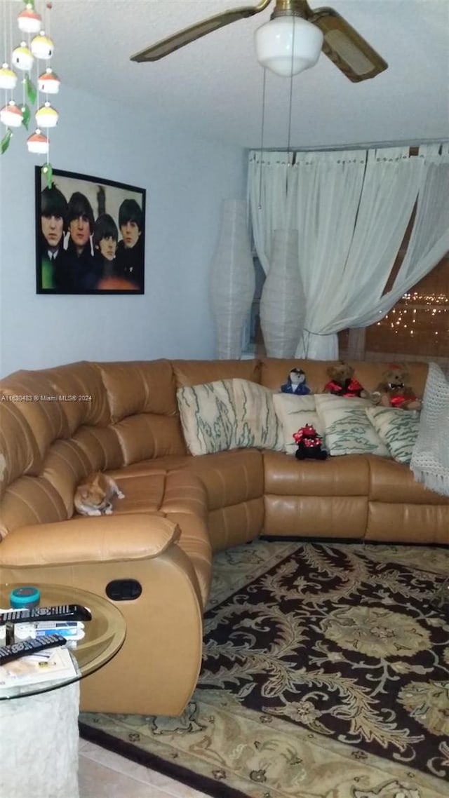 living room featuring ceiling fan