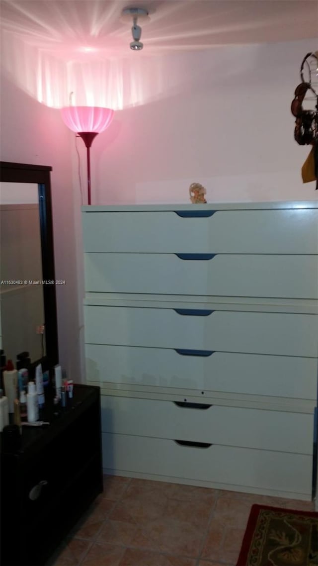 bathroom featuring tile patterned flooring