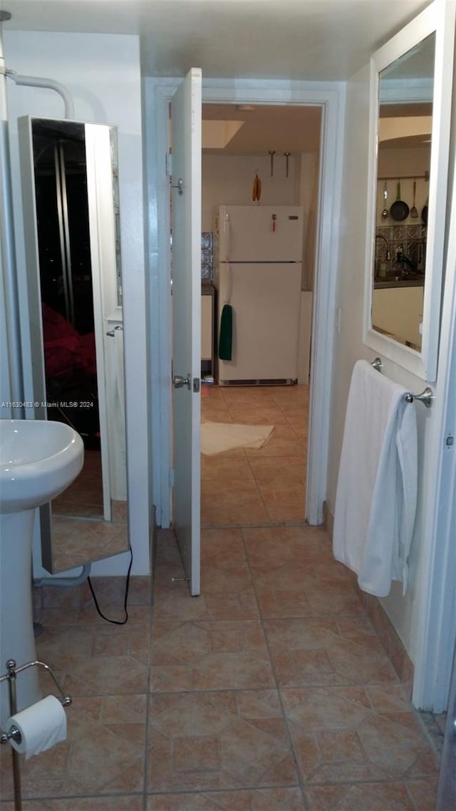 bathroom featuring tile patterned flooring