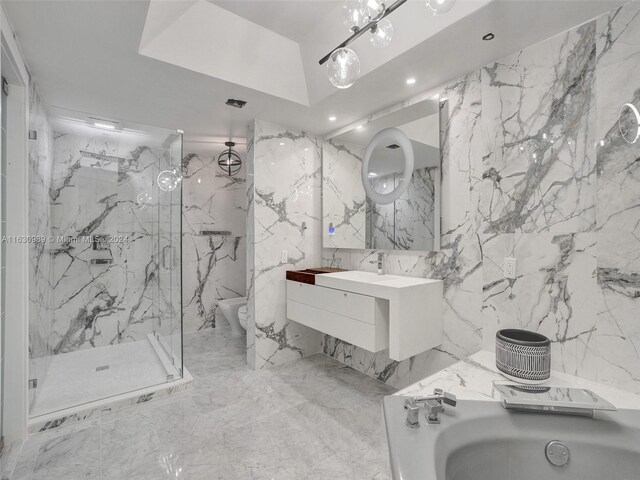 bathroom featuring tile patterned flooring, tile walls, independent shower and bath, and vanity