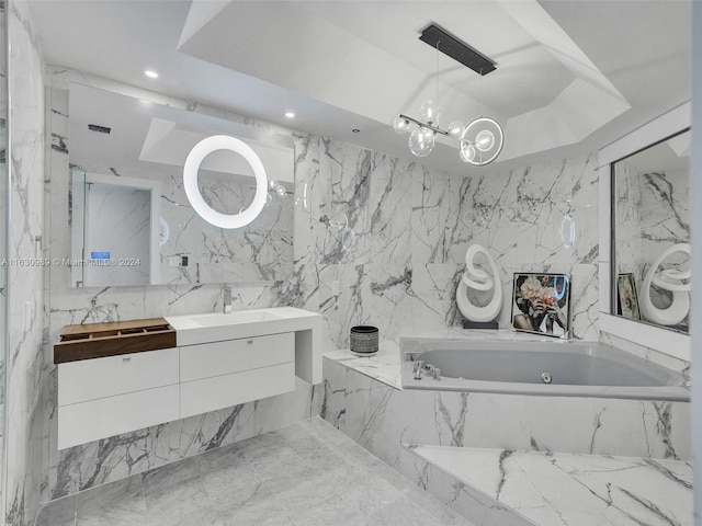 bathroom featuring dual vanity, a relaxing tiled tub, tile walls, and tile patterned flooring