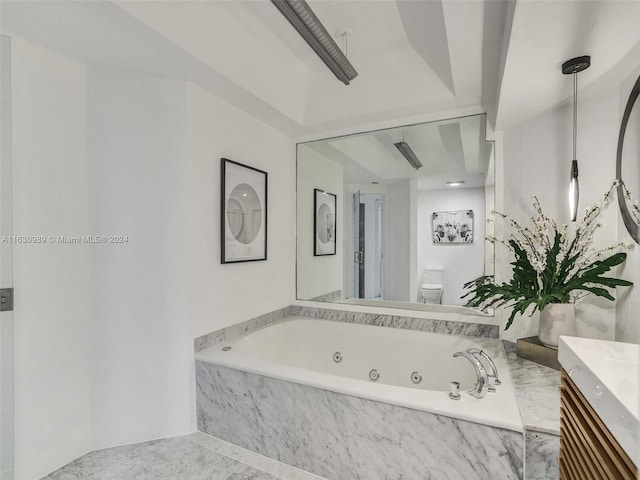 bathroom featuring tile patterned floors, vanity, and toilet