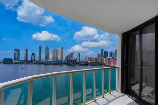 balcony featuring a water view