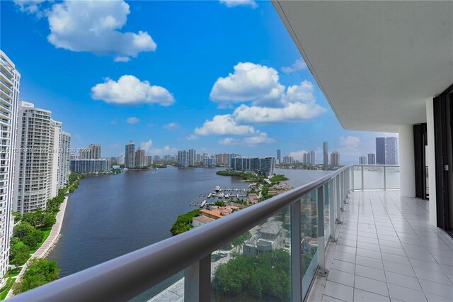 balcony featuring a water view