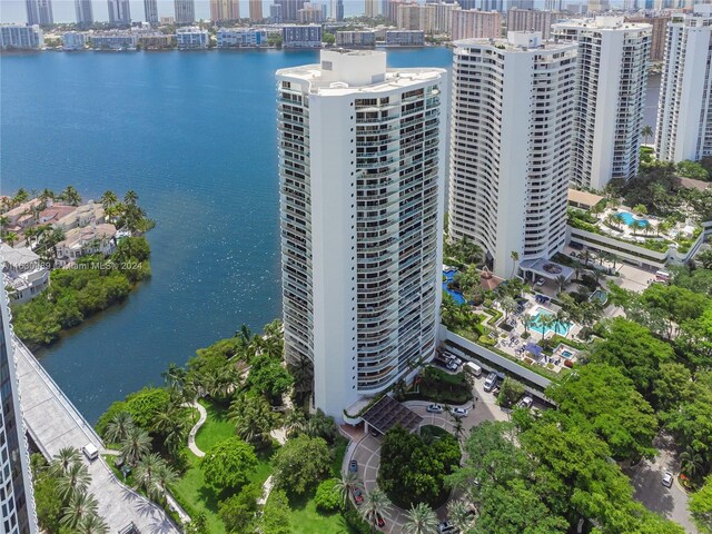 birds eye view of property featuring a water view