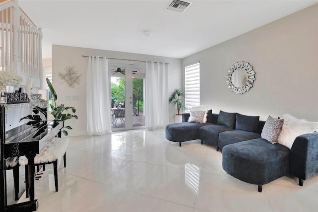 tiled living room with french doors