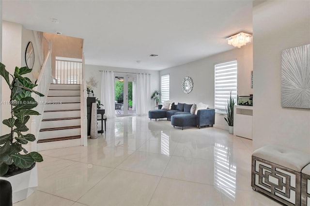 tiled living room with french doors