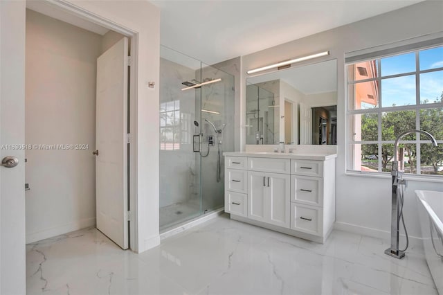 bathroom with vanity and walk in shower