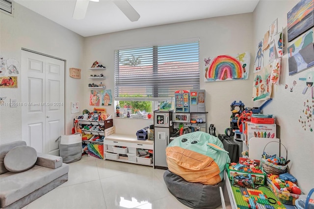 recreation room featuring ceiling fan and light tile patterned flooring