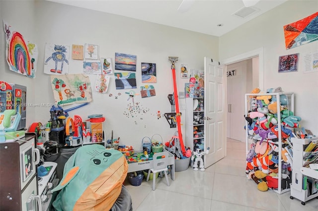 playroom with light tile patterned flooring