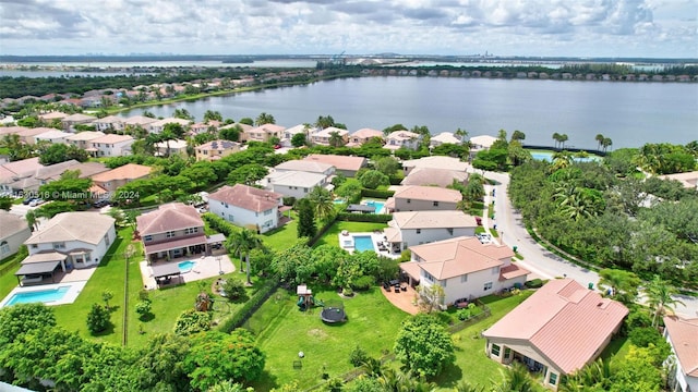 birds eye view of property featuring a water view