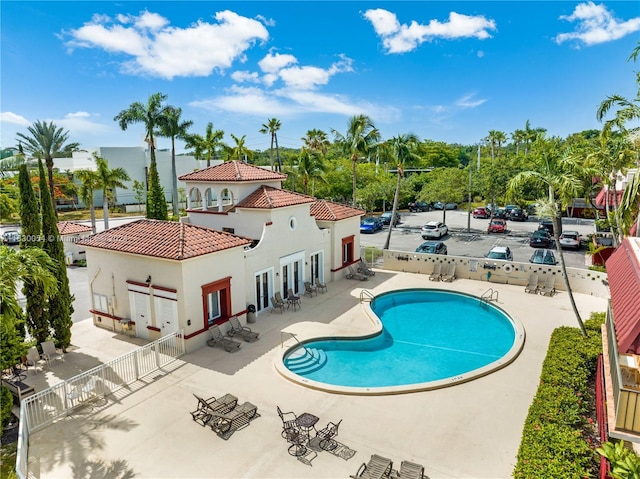 view of pool featuring a patio area