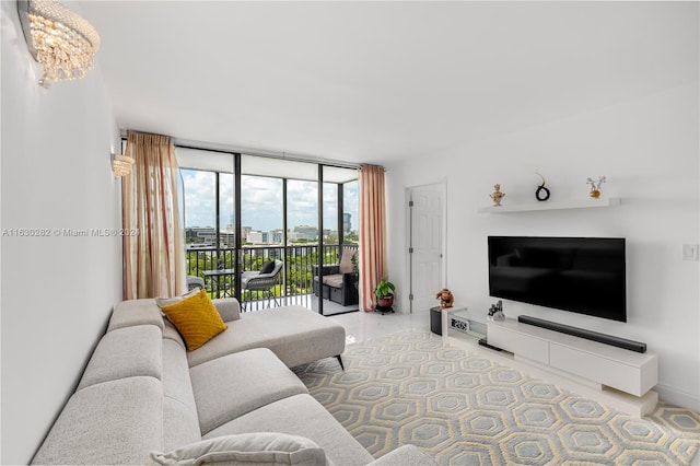 living room featuring floor to ceiling windows