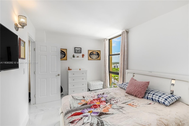 bedroom with tile patterned floors