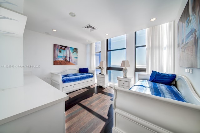 bedroom featuring hardwood / wood-style floors