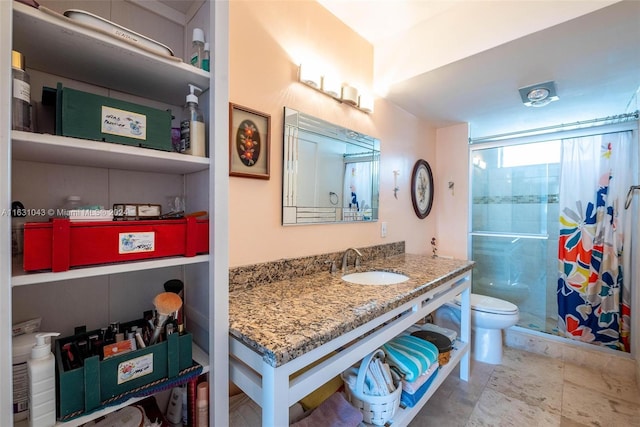 bathroom featuring vanity, an enclosed shower, tile patterned flooring, and toilet