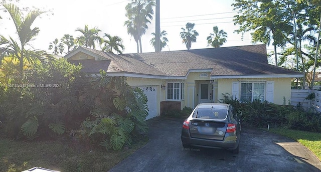 view of front of property featuring a garage