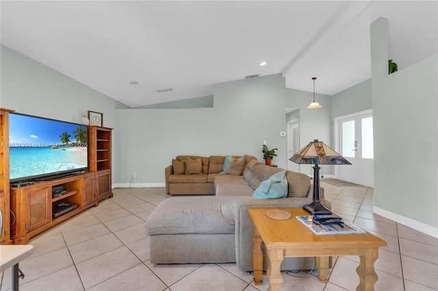 living room with light tile patterned floors, french doors, baseboards, and vaulted ceiling