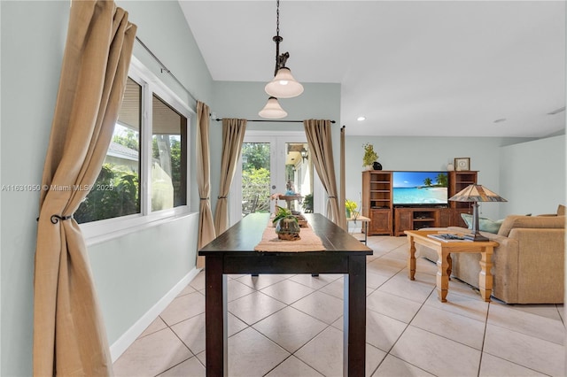 dining area with recessed lighting, light tile patterned floors, french doors, and baseboards