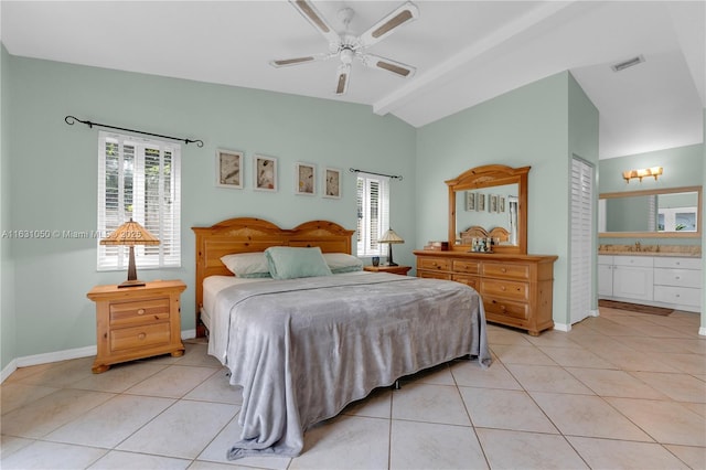 bedroom with multiple windows, lofted ceiling, visible vents, and light tile patterned flooring