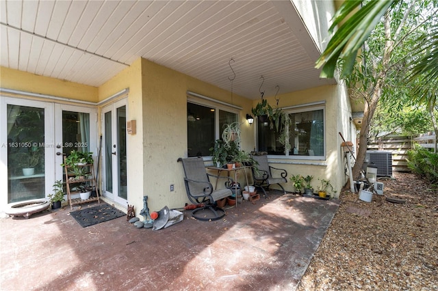 view of patio / terrace featuring french doors and central AC