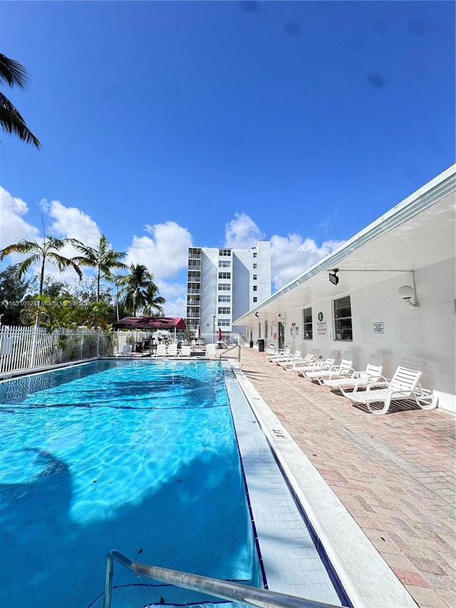 view of pool featuring a patio