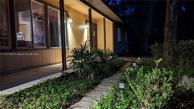 view of property exterior at twilight