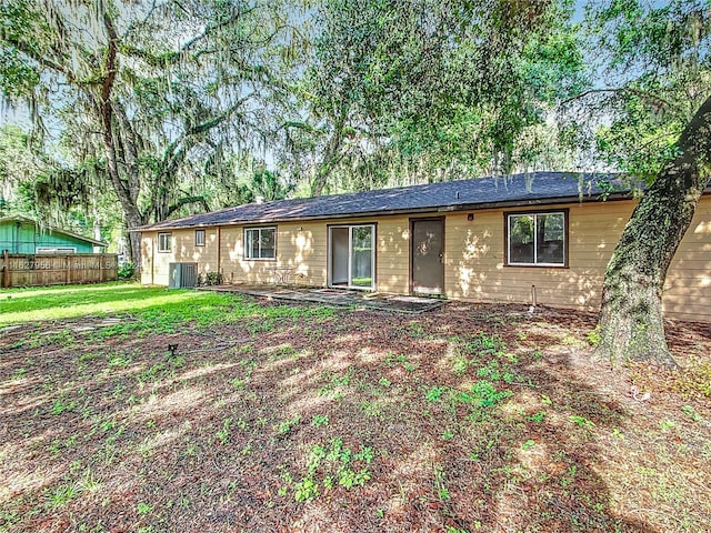 single story home featuring cooling unit