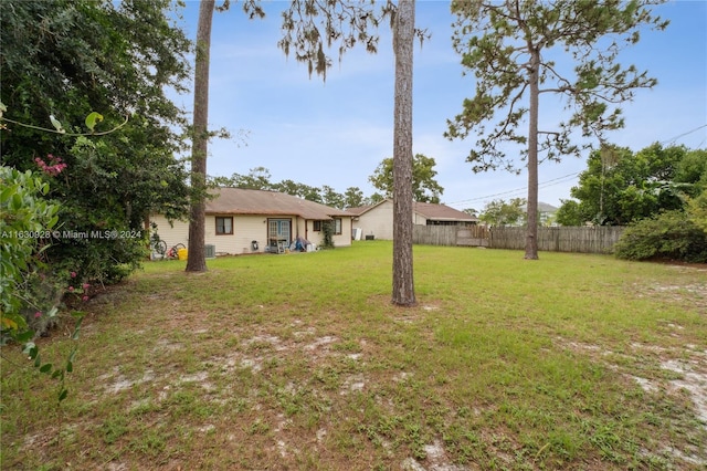 view of yard featuring fence