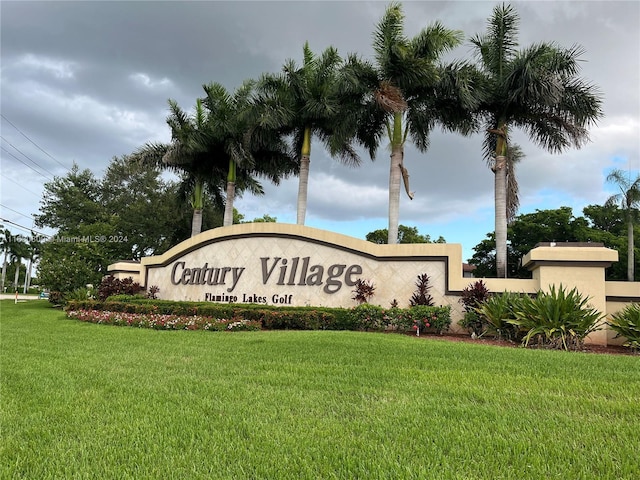 community sign with a yard