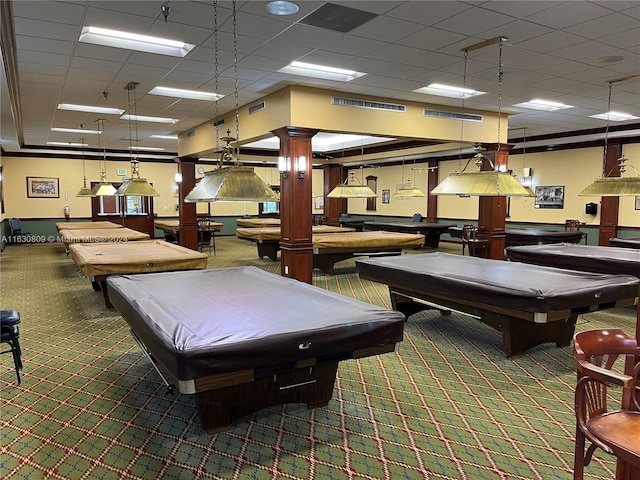 rec room with a paneled ceiling, decorative columns, crown molding, billiards, and carpet flooring