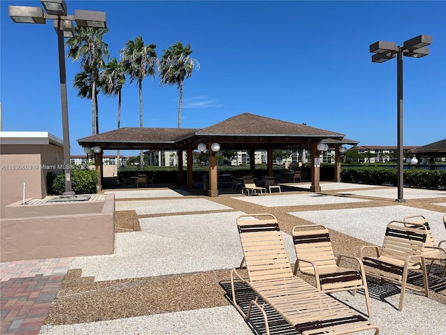 view of property's community featuring a patio and a gazebo