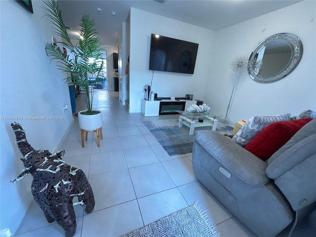 living room with light tile patterned flooring