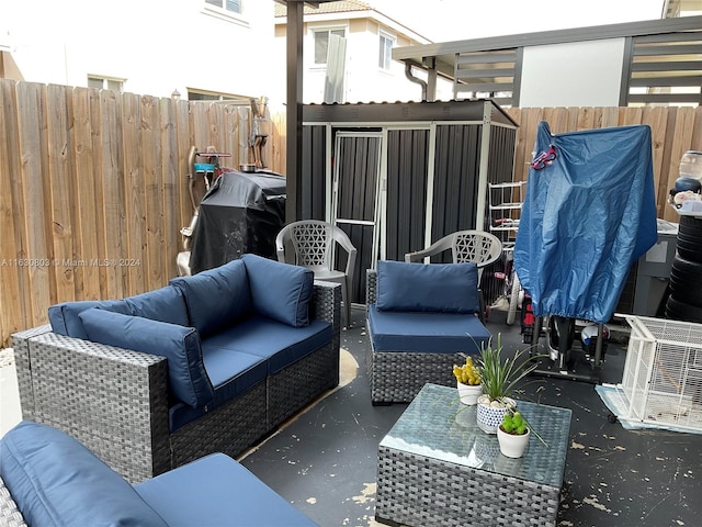 view of patio / terrace featuring outdoor lounge area and a grill