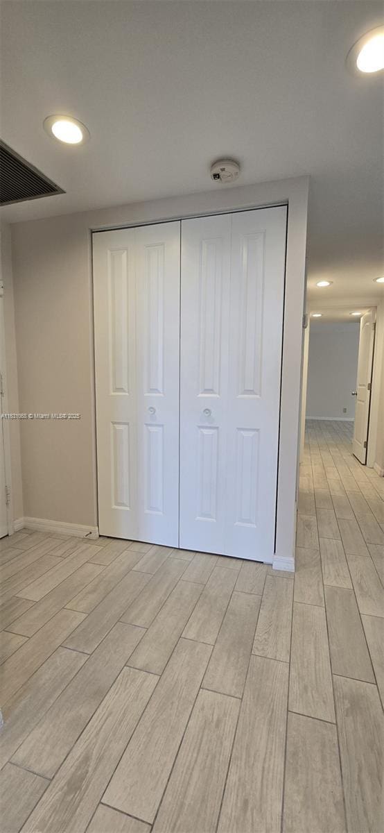 unfurnished bedroom featuring a closet