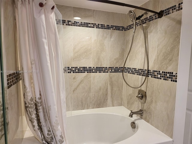 bathroom featuring shower / bath combo with shower curtain