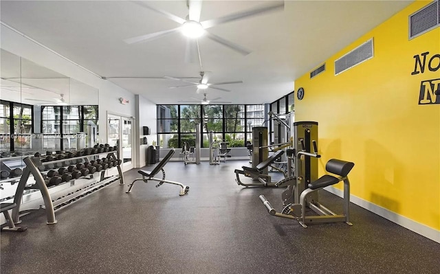 gym with plenty of natural light and ceiling fan