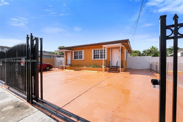 2901 SW 21st St, Miami, FL 33145 - view of front of home with a gate and stucco siding