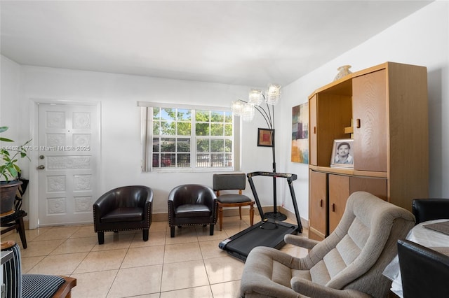 2901 SW 21st St, Miami, FL 33145 - living area featuring a chandelier, light tile patterned floors, and baseboards